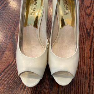 Never worn Michael Kors Platform Wedge. Size 8.5